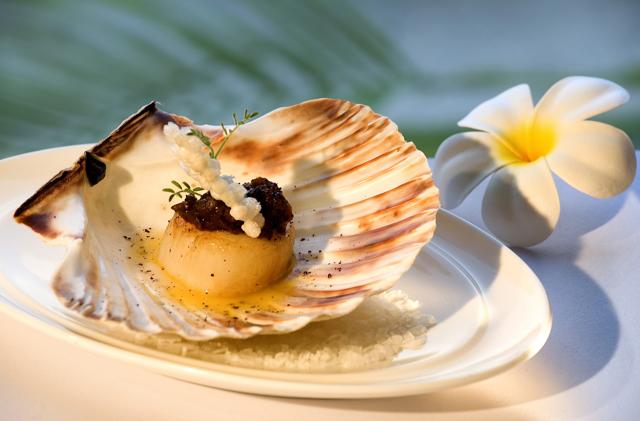 Roast scallops balchao is served with saboodana papad and kokum powder at Indian Accent.