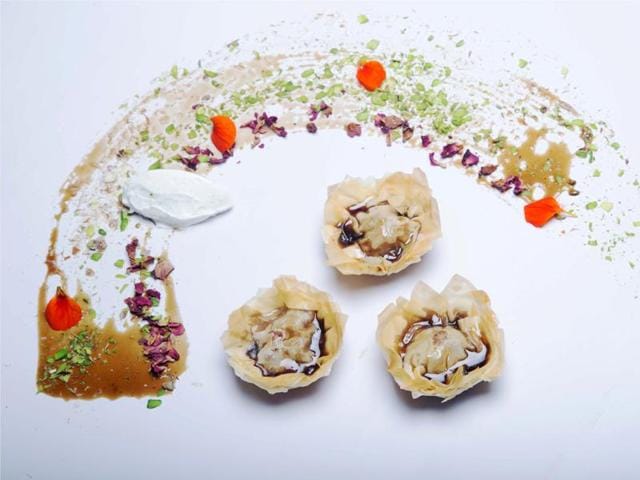 Pear Baklava served with pistachio launji and vanilla bean ice cream at Farzi Cafe in Dubai, which opened in late March.
