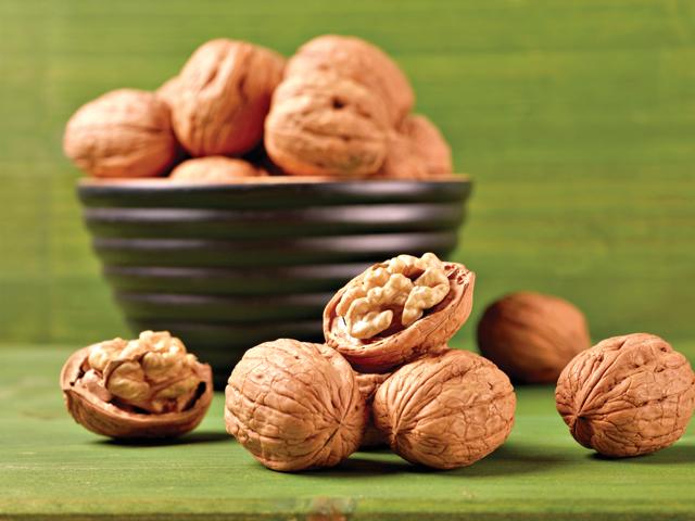 Walnuts are rich in vitamin E, and boost healthy hair and skin (Shutterstock)
