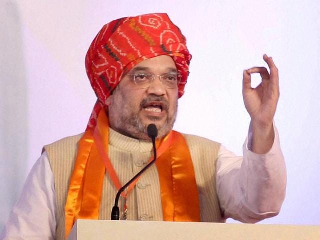BJP President Amit Shah addressing a election rally at Dholia in Cachar district of Barak Valley on Thursday evening. (HT Photo) BJP President Amit Shah addressing a election rally at Dholia in Cachar district of Barak Valley on Thursday evening. (HT Photo)