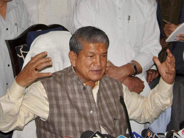 Harish Rawat was reportedly shown black flags and his convoy was pelted with stones in Dehradun . (PTI File Photo) Harish Rawat was reportedly shown black flags and his convoy was pelted with stones in Dehradun . (PTI File Photo)