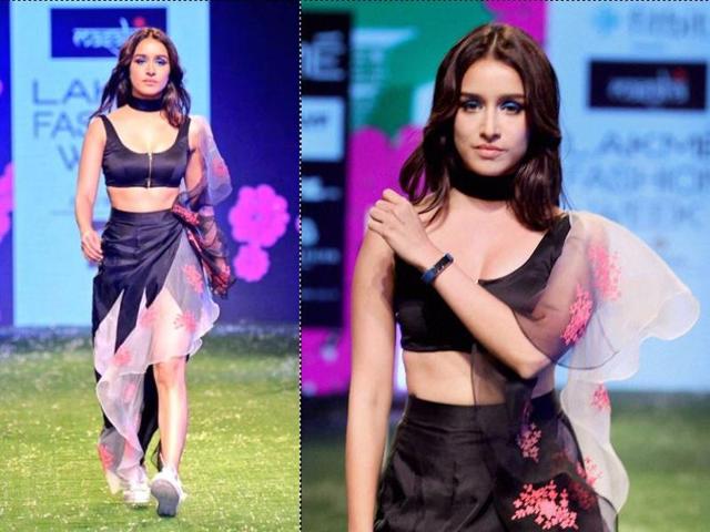 Bollywood actress Shraddha Kapoor displays a creation by Masaba during the Lakme Fashion Week in Mumbai. (PTI) 