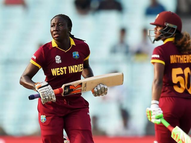 West Indies captain Stafanie Taylor holds the cup as she celebrates with team-mates at the Eden Gardens in Kolkata on Sunday. (AP) West Indies captain Stafanie Taylor holds the cup as she celebrates with team-mates at the Eden Gardens in Kolkata on Sunday. (AP)