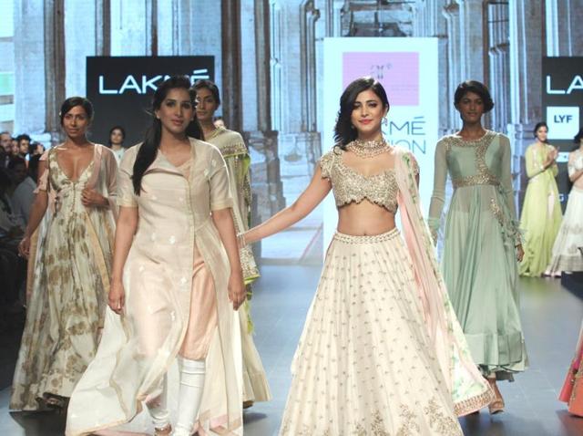 Actress Shruti Haasan displays the creation of fashion designer Anushree Reddy show during the Lakme Fashion Week Summer Resort 2016 in Mumbai. (IANS) 
