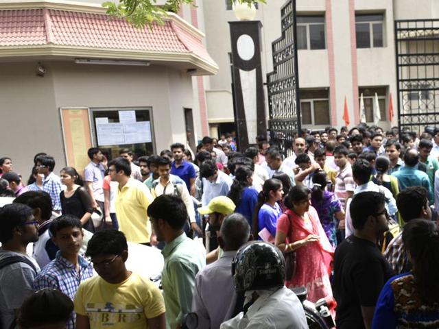 Students come outside the examination hall after the end of JEE (Mains) paper 1 in New Delhi on Sunday. (Vipin Kumar / Hindustan Times)