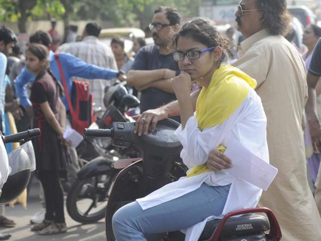 Students waiting outside exam center to take JEE (Mains) in Lucknow on Sunday. (Deepak Gupta/ Hindustan Times)
