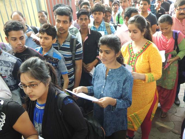 Students going inside exam center to take JEE (Main) exam, parents wished good luck and blessed their childrens as they walk exam hall in Lucknow India on Sunday. (Deepak Gupta) Students going inside exam center to take JEE (Main) exam, parents wished good luck and blessed their childrens as they walk exam hall in Lucknow India on Sunday. (Deepak Gupta)