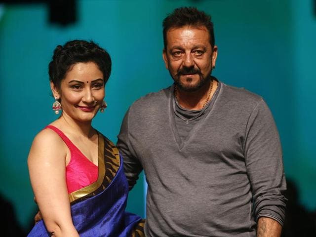Bollywood actor Sanjay Dutt and his wife Manyata pose for the media during the Lakme Fashion Week in Mumbai. (AP) 