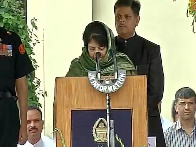 Governor NN Vohra administered oath of office and secrecy to Mufti at Raj Bhavan in Jammu, who became the 13th chief minister of the state. (ANI Photo) Governor NN Vohra administered oath of office and secrecy to Mufti at Raj Bhavan in Jammu, who became the 13th chief minister of the state. (ANI Photo)