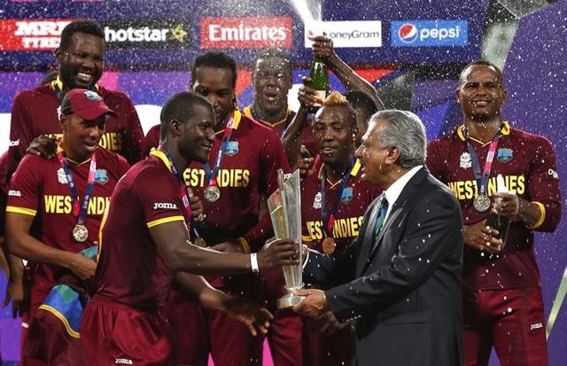 World Twenty20 cricket tournament final - Kolkata, India - 03/04/2016. West Indies captain Darren Sammy (3rd L) receives the trophy from Zaheer Abbas, President of International Cricket Council (ICC), after they won the final. REUTERS/Adnan Abidi (Reuters) World Twenty20 cricket tournament final - Kolkata, India - 03/04/2016. West Indies captain Darren Sammy (3rd L) receives the trophy from Zaheer Abbas, President of International Cricket Council (ICC), after they won the final. REUTERS/Adnan Abidi (Reuters)