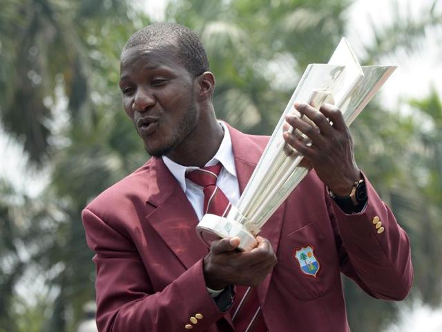 West Indies captain Darren with the World T20 trophy in Kolkata on Monday, a day after winning the title. (AFP) West Indies captain Darren with the World T20 trophy in Kolkata on Monday, a day after winning the title. (AFP)