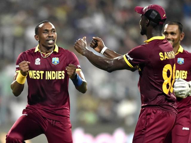 West Indies bowler Dwayne Bravo being congratulated by team mates. (Ajay Aggarwal/HT Photo) 