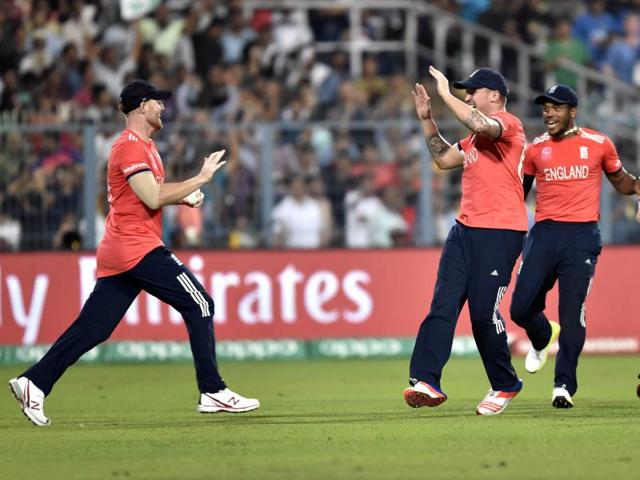 England player Joe Root and others celebrates the dismissal of West Indies batsman Chris Gayle. (Ajay Aggarwal/HT Photo) 
