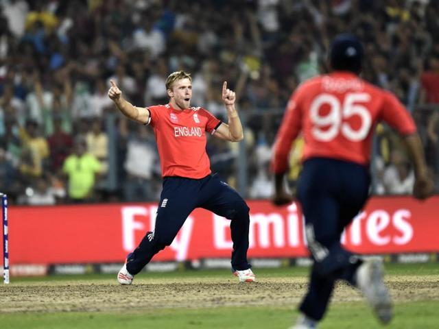 England team player David Willey celebrates the dismissal of West Indies batsman Andre Russell. (Ajay Aggarwal) 