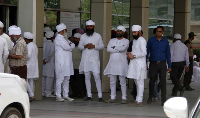 Followers of Namdhari sect gathered at the hospital where Mata Chand Kaur was taken, at Bhaini Sahib in Ludhiana on Monday. (JS Grewal/HT Photo) Followers of Namdhari sect gathered at the hospital where Mata Chand Kaur was taken, at Bhaini Sahib in Ludhiana on Monday. (JS Grewal/HT Photo)