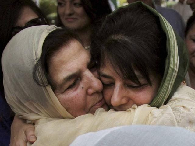 Chief Minister Mehbooba Mufti (R) hugs her mother Gulshan Ara Nazir at a ceremony in Jammu where she was sworn in as Jammu and Kashmir’s CM. (PTI) Chief Minister Mehbooba Mufti (R) hugs her mother Gulshan Ara Nazir at a ceremony in Jammu where she was sworn in as Jammu and Kashmir’s CM. (PTI)