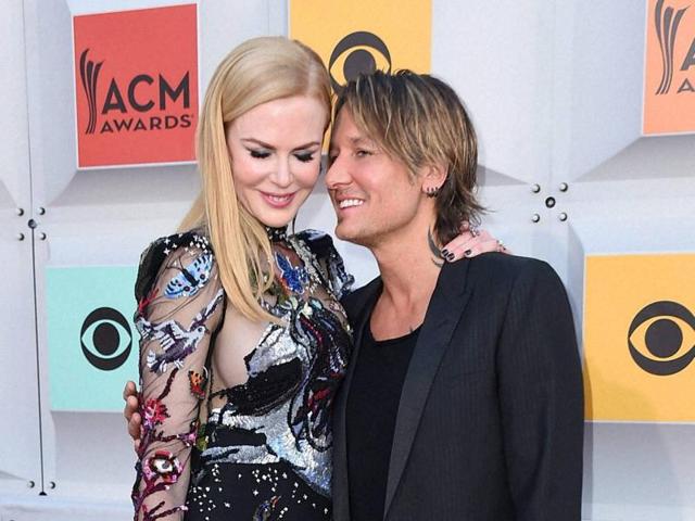 Nicole Kidman, left, and Keith Urban arrive at the awards. (AP)