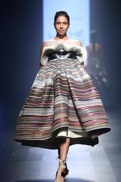 Stripes: Some trends never fail to impress the fashion folks, and stripes is one such pattern. The versatile lines have been the favourite of fashionistas since the very beginning and they continue to garner applause. This season, too, it will be used in a big way as designers can’t get enough of it. Here, a model showcases a striped dress by Amit Aggarwal. Stripes: Some trends never fail to impress the fashion folks, and stripes is one such pattern. The versatile lines have been the favourite of fashionistas since the very beginning and they continue to garner applause. This season, too, it will be used in a big way as designers can’t get enough of it. Here, a model showcases a striped dress by Amit Aggarwal.