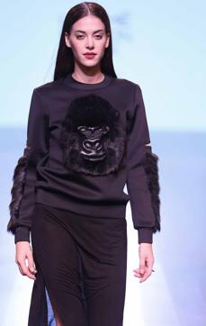 Animal Motifs: There is good news for animal lovers. You can now showcase your love for different creatures now by opting for apparels inspired by them. Aartivijay Gupta and Huemn used this element as their prime inspiration this season. Here, a model showcases a Gorilla-faced sweatshirt by Huemn. Animal Motifs: There is good news for animal lovers. You can now showcase your love for different creatures now by opting for apparels inspired by them. Aartivijay Gupta and Huemn used this element as their prime inspiration this season. Here, a model showcases a Gorilla-faced sweatshirt by Huemn.