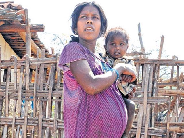 Five-month pregnant Kalavati Devi’s husband is one of many Jharkhand villagers who have migrated to other states for work.(Parwaz Khan/HT Photo)