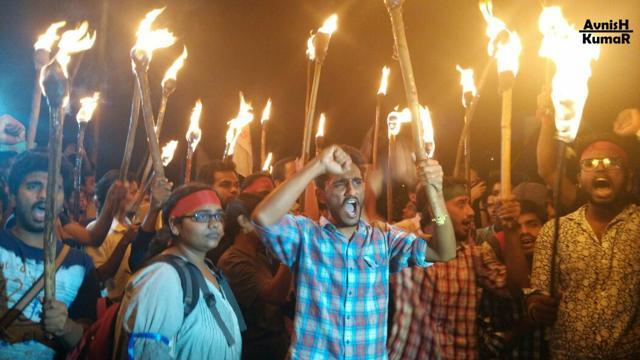 Students being welcomed by their friends as they reach campus after getting released from jail. (Special arrangement )