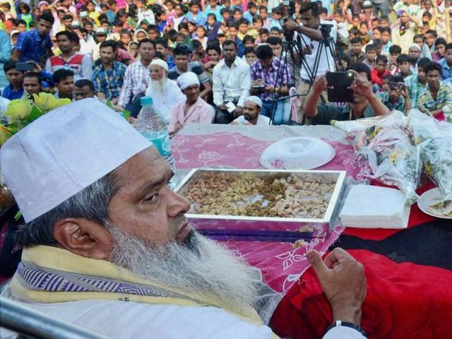 File photo of AIUDF chief Badruddin Ajmal (L) and AIUDF general secretary Aditya Langthasa (R) at an election rally at Jorsimulu village in Chaygaon assembly constituency in Assam. (PTI) File photo of AIUDF chief Badruddin Ajmal (L) and AIUDF general secretary Aditya Langthasa (R) at an election rally at Jorsimulu village in Chaygaon assembly constituency in Assam. (PTI)