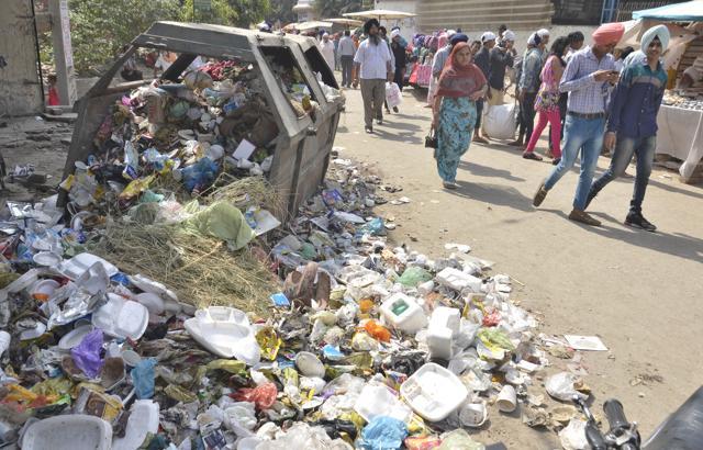 The agitating workers said that they would not lift garbage till their demands were met. They said an ultimatum had been given to the municipal corporation to meet their demands, but as the civic body failed to address their issues, going on strike was the only option left with them. (Sameer Sehgal/HT Photo) The agitating workers said that they would not lift garbage till their demands were met. They said an ultimatum had been given to the municipal corporation to meet their demands, but as the civic body failed to address their issues, going on strike was the only option left with them. (Sameer Sehgal/HT Photo)