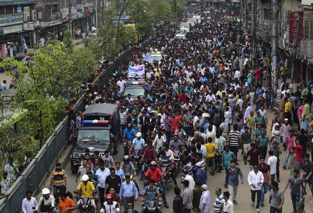 Bangladesh Nationalist Party (BNP) supporters follow vehicles escorting former Bangladesh prime minister Khaleda Zia after she appeared in a court in Dhaka on Tuesday. (AFP) Bangladesh Nationalist Party (BNP) supporters follow vehicles escorting former Bangladesh prime minister Khaleda Zia after she appeared in a court in Dhaka on Tuesday. (AFP)