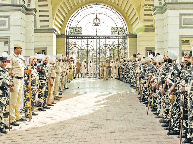 Heavy security at the Namdhari sect headquarters after the murder of Chand Kaur at Bhaini Sahib near Ludhiana on Monday. (JS Grewal/HT Photo) Heavy security at the Namdhari sect headquarters after the murder of Chand Kaur at Bhaini Sahib near Ludhiana on Monday. (JS Grewal/HT Photo)