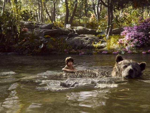 Mowgli is friends with Baloo, the free-spirited bear voiced by Bill Murray. (Disney) Mowgli is friends with Baloo, the free-spirited bear voiced by Bill Murray. (Disney)