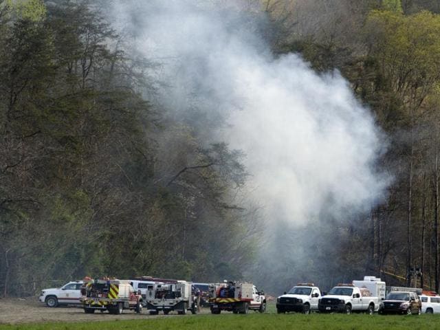 Pigeon Forge police chief, Jack Baldwin, speaks to media at the site where a sightseeing helicopter crashed Monday, April 4, 2016, near Sevierville, Tennessee. (AP Photo) Pigeon Forge police chief, Jack Baldwin, speaks to media at the site where a sightseeing helicopter crashed Monday, April 4, 2016, near Sevierville, Tennessee. (AP Photo)