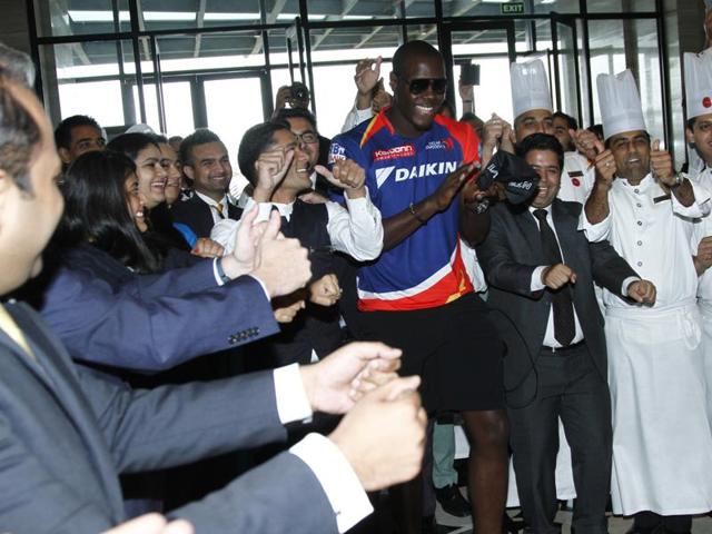 West Indian cricketer Carlos Brathwaite joined the hotel staff and guests in the champions dance at Novotel Hotel, Aerocity.(Photo: Waseem Gashroo/HT)