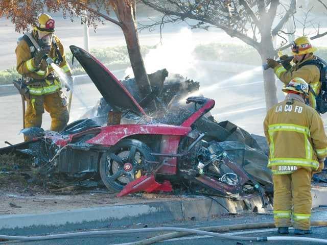 Walker was riding in the Carrera GT driven by his friend Roger Rodas when the car spun out of control, struck three trees and burst into flames on a street in Santa Clarita in November 2013. Walker was riding in the Carrera GT driven by his friend Roger Rodas when the car spun out of control, struck three trees and burst into flames on a street in Santa Clarita in November 2013.