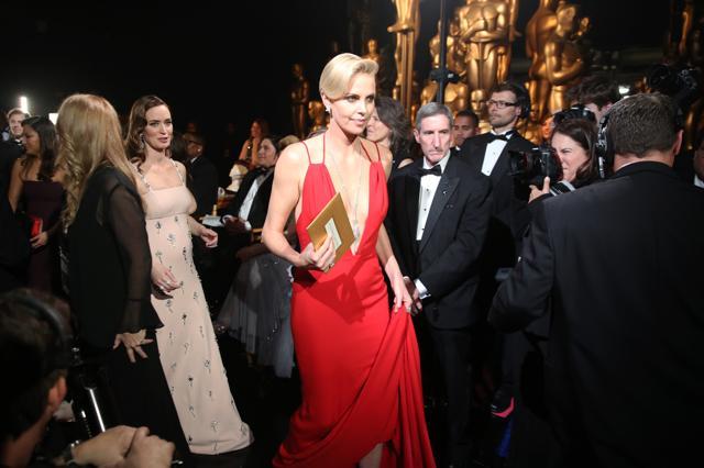 Charlize Theron, with Emily Blunt seen backstage at the Oscars on 28 February at the Dolby Theatre in Los Angeles. (AP) Charlize Theron, with Emily Blunt seen backstage at the Oscars on 28 February at the Dolby Theatre in Los Angeles. (AP)