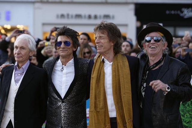 Members of the Rolling Stones (L-R) Charlie Watts, Ronnie Wood, Mick Jagger and Keith Richards arrive for the Exhibitionism opening night gala at the Saatchi Gallery in London, Britain April 4, 2016. (REUTERS)