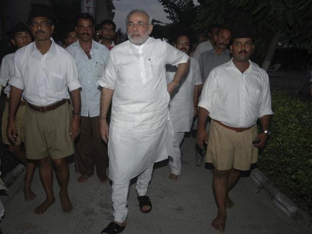 Narendra Modi after a meeting with the Rashtriya Swayamsevak Sangh at Adalaj, near Ahmedabad, September 6, 2009.(AP) Narendra Modi after a meeting with the Rashtriya Swayamsevak Sangh at Adalaj, near Ahmedabad, September 6, 2009.(AP)