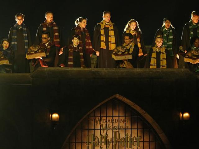Performers sing during a special preview opening of The Wizarding World of Harry Potter attraction at Universal Studios Hollywood in Universal City. (REUTERS)