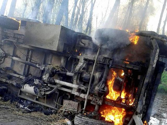 A police vehicle was set on fire by protesters near an encounter site in which two Hizbul Mujahideen militants militants were killed at Shopian district of south Kashmir on Thursday, April 7, 2016. (PTI) A police vehicle was set on fire by protesters near an encounter site in which two Hizbul Mujahideen militants militants were killed at Shopian district of south Kashmir on Thursday, April 7, 2016. (PTI)
