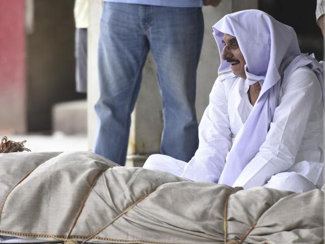 Grieving Father of 32-year-old Sidharth Sharma business consultant who was killed when a speeding Mercedes car allegedly driven by a teen, hit him while he was crossing the road on Monday night. (Photo by Sonu Mehta/ Hindustan Times) (Hindustan Times) Grieving Father of 32-year-old Sidharth Sharma business consultant who was killed when a speeding Mercedes car allegedly driven by a teen, hit him while he was crossing the road on Monday night. (Photo by Sonu Mehta/ Hindustan Times) (Hindustan Times)