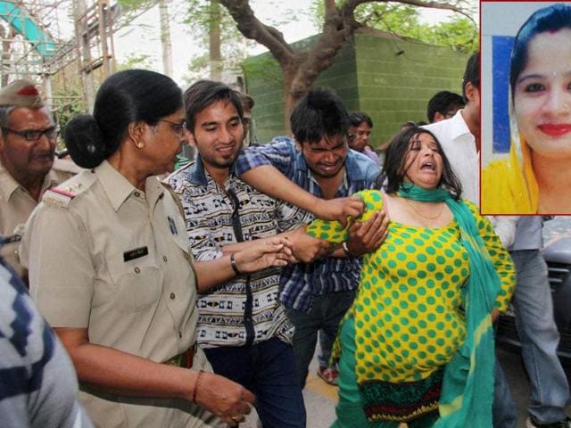 Family members of Himanshi Kashyap, (inset) , daughter-in-law of BSP Rajya Sabha member Narendra Kashyap, mourn her death. (PTI Photo) Family members of Himanshi Kashyap, (inset) , daughter-in-law of BSP Rajya Sabha member Narendra Kashyap, mourn her death. (PTI Photo)