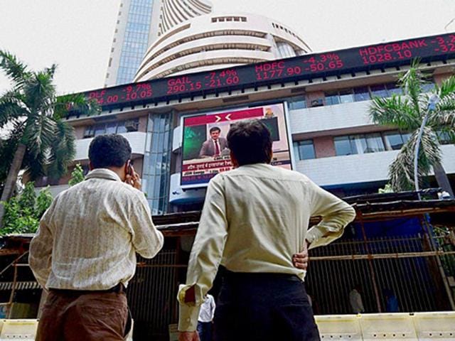 Investors outside the Bombay Stock Exchange (BSE) . (PTI File Photo) Investors outside the Bombay Stock Exchange (BSE) . (PTI File Photo)