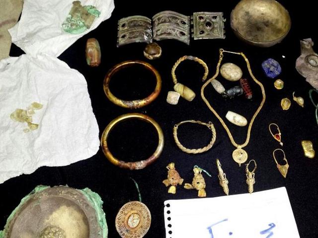 This photo provided by The Day After Heritage Initiative, shows jewellery looted from archeological sites in Deir el-Zour and displayed for sale by the Islamic State group in Syria. (AP Photo) This photo provided by The Day After Heritage Initiative, shows jewellery looted from archeological sites in Deir el-Zour and displayed for sale by the Islamic State group in Syria. (AP Photo)