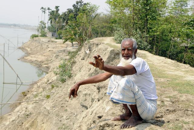 Hanif Ali Miyan, a retired teacher from Phulbari, Barpeta, lost all his farm land to the river. He estimates some 10-12 bigha land has been lost. Located on the Brahmaputra bank, Hanif’s house is hardly 50 metres from the river. One more severe flood season and he’ll lose his house too. (Subhendu Ghosh / Hindustan Times) Hanif Ali Miyan, a retired teacher from Phulbari, Barpeta, lost all his farm land to the river. He estimates some 10-12 bigha land has been lost. Located on the Brahmaputra bank, Hanif’s house is hardly 50 metres from the river. One more severe flood season and he’ll lose his house too. (Subhendu Ghosh / Hindustan Times)