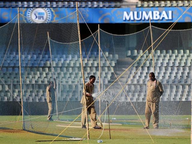 Groundsmen water the pitch at the Wankhede stadium, which will host the IPL opening ceremony on April 8, followed by the tournament opener between Mumbai Indians and Rising Pune Supergiants on April 9. (PTI) Groundsmen water the pitch at the Wankhede stadium, which will host the IPL opening ceremony on April 8, followed by the tournament opener between Mumbai Indians and Rising Pune Supergiants on April 9. (PTI)