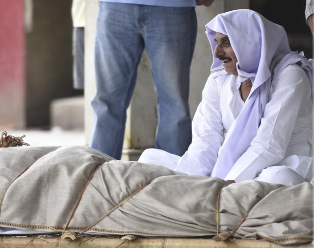 Siddharth Sharma’s father mourns his death. (Sonu Mehta/HT Photo) Siddharth Sharma’s father mourns his death. (Sonu Mehta/HT Photo)