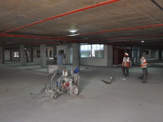 The parking, which has come up at the existing Gurdev parking, was to be completed in October last year. (Karun Sharma/HT Photo)