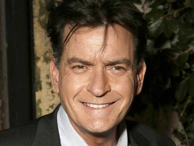 Sheen's ex-fiancee Scottine Ross was given a temporary restraining order based on a filing in which she said she was fearful of the actor over threats he purportedly made in an audio recording. (TODD WILLIAMSON/INVISION/AP) Sheen's ex-fiancee Scottine Ross was given a temporary restraining order based on a filing in which she said she was fearful of the actor over threats he purportedly made in an audio recording. (TODD WILLIAMSON/INVISION/AP)
