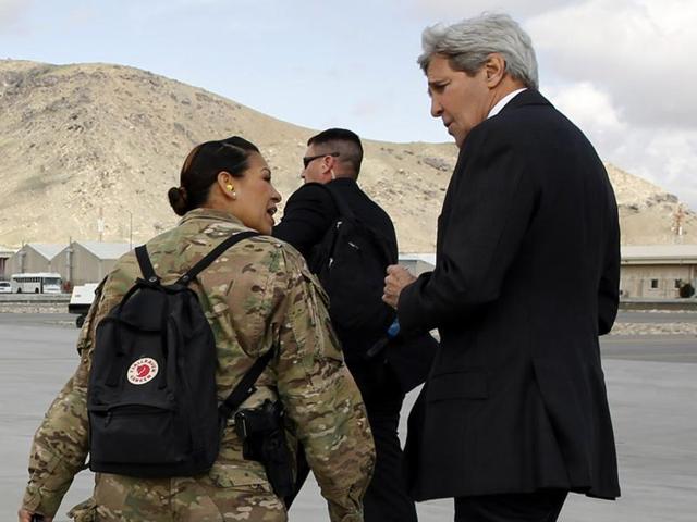US Secretary of State John Kerry, right, arrives at Kabul International Airport for a day of meetings with Afghan leaders in Kabul. (Reuters Photo) US Secretary of State John Kerry, right, arrives at Kabul International Airport for a day of meetings with Afghan leaders in Kabul. (Reuters Photo)