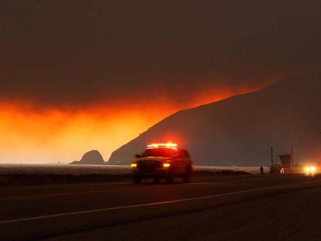 (Representative image) A man who took a video of himself surrounded by flames that erupted into one of the worst California wildfires of 2014 was fined $60 million and sentenced to 20 years in prison . (AP File Photo) (Representative image) A man who took a video of himself surrounded by flames that erupted into one of the worst California wildfires of 2014 was fined $60 million and sentenced to 20 years in prison . (AP File Photo)