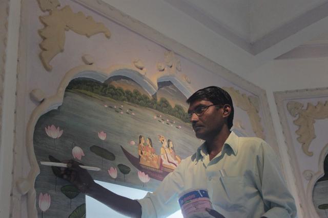 Travel planners such as BreakAway offer to let you watch as artists from Rajasthan work on heritage structures. Here, a fresco gets a fresh coat at the Phool Mahal Palace in Kishangarh.